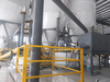 Sistema de escala de materiales de suspensión y polvo