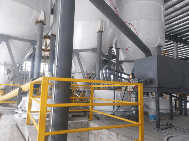 Sistema de escala de materiales de suspensión y polvo