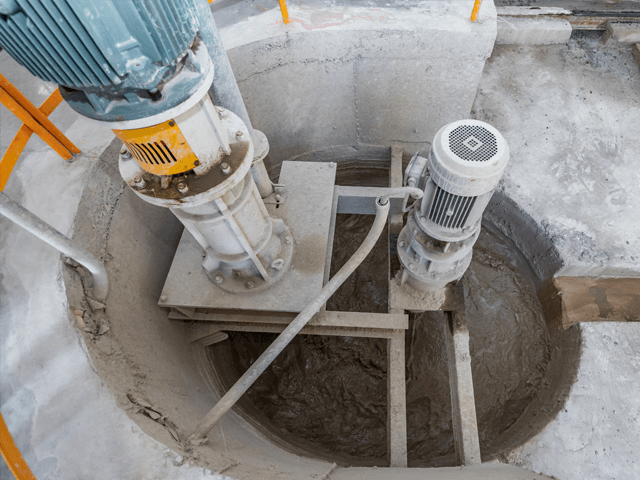 Sistema de escala de materiales de suspensión y polvo